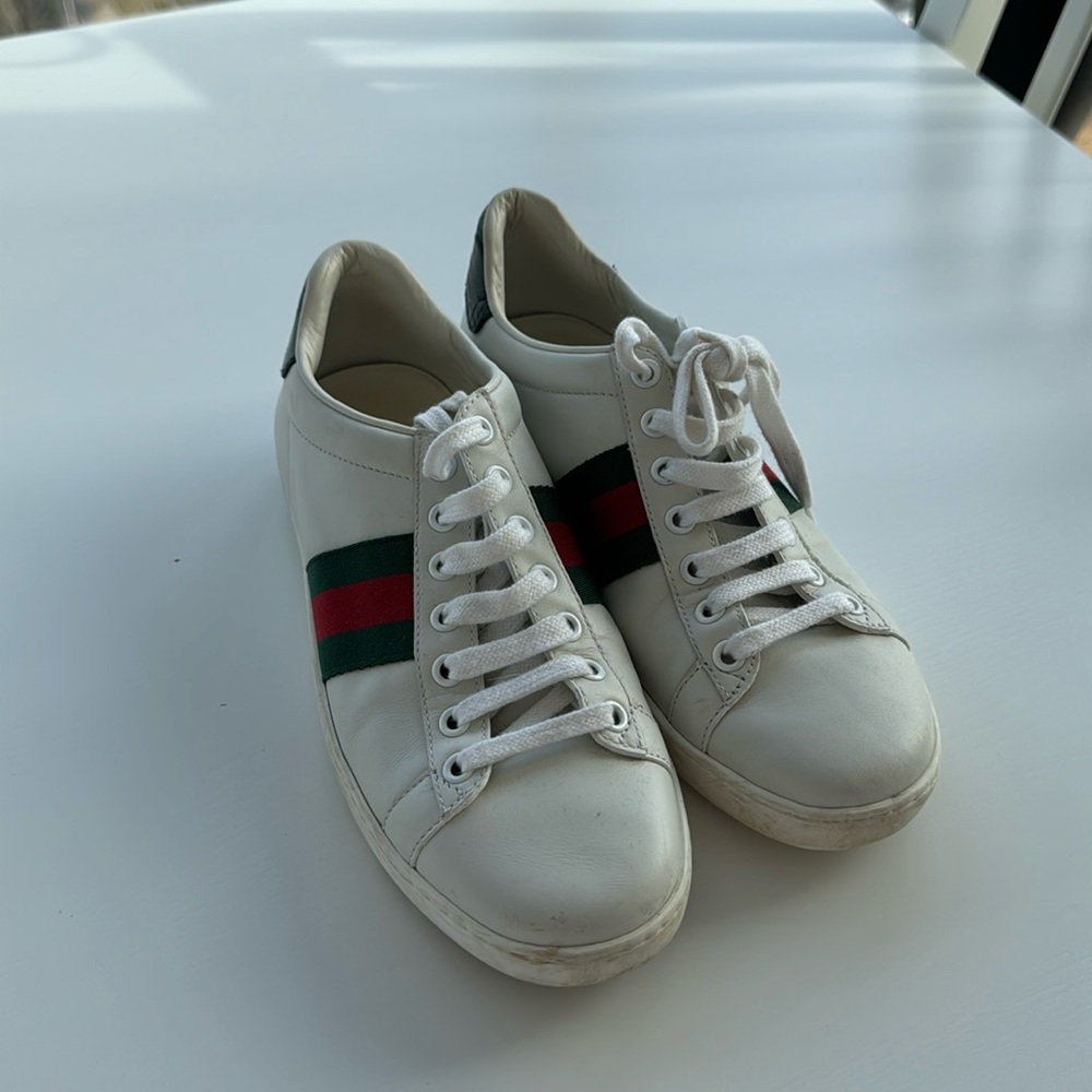 Guccis white sneakers barely worn